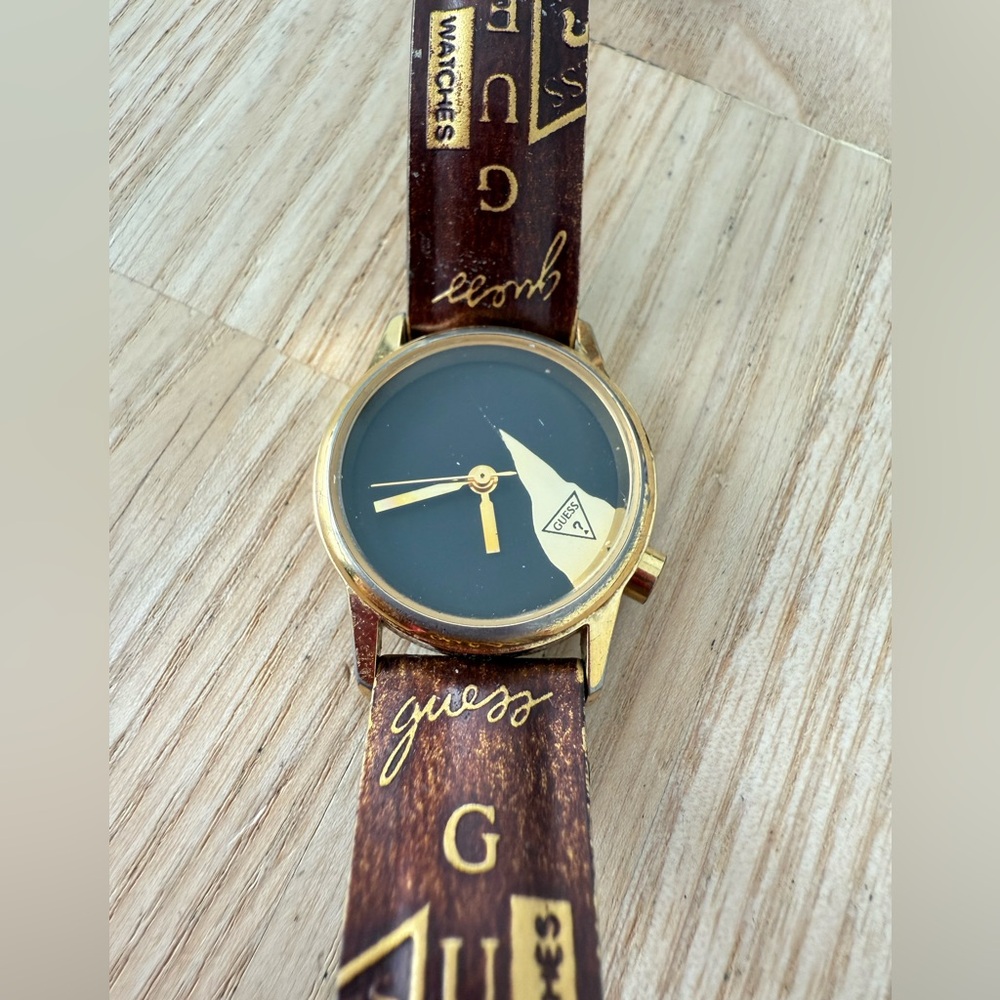 Vintage 90s Guess ladies black dial gold tone branded watch NEW BATTERY
